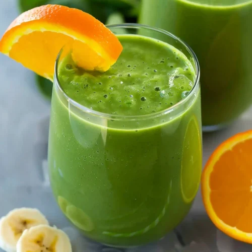 Creamy Green Smoothie with Banana, Orange, and Pineapple